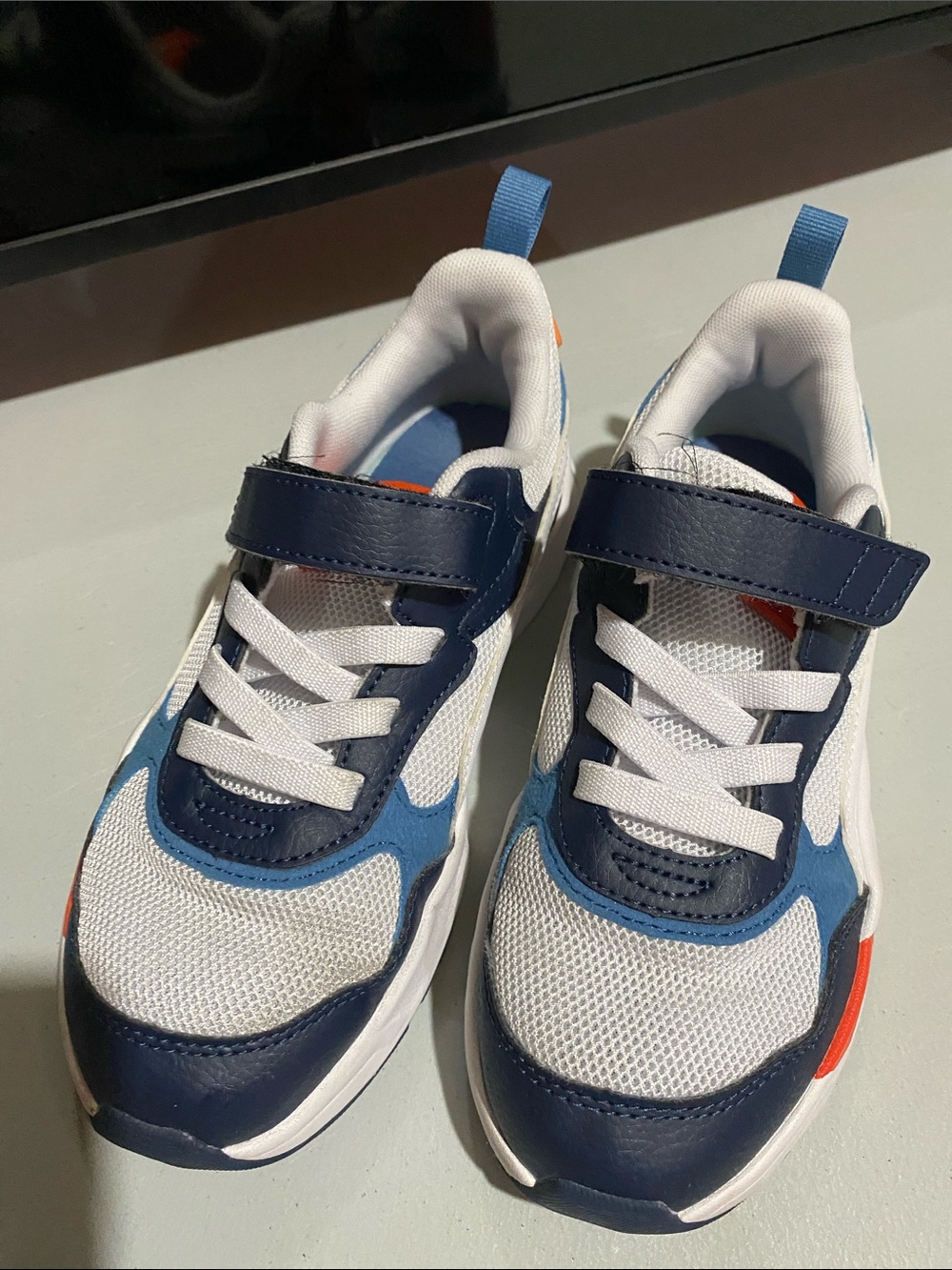 PUMA Kids Navy & White Athletic Sneakers with Orange Accent